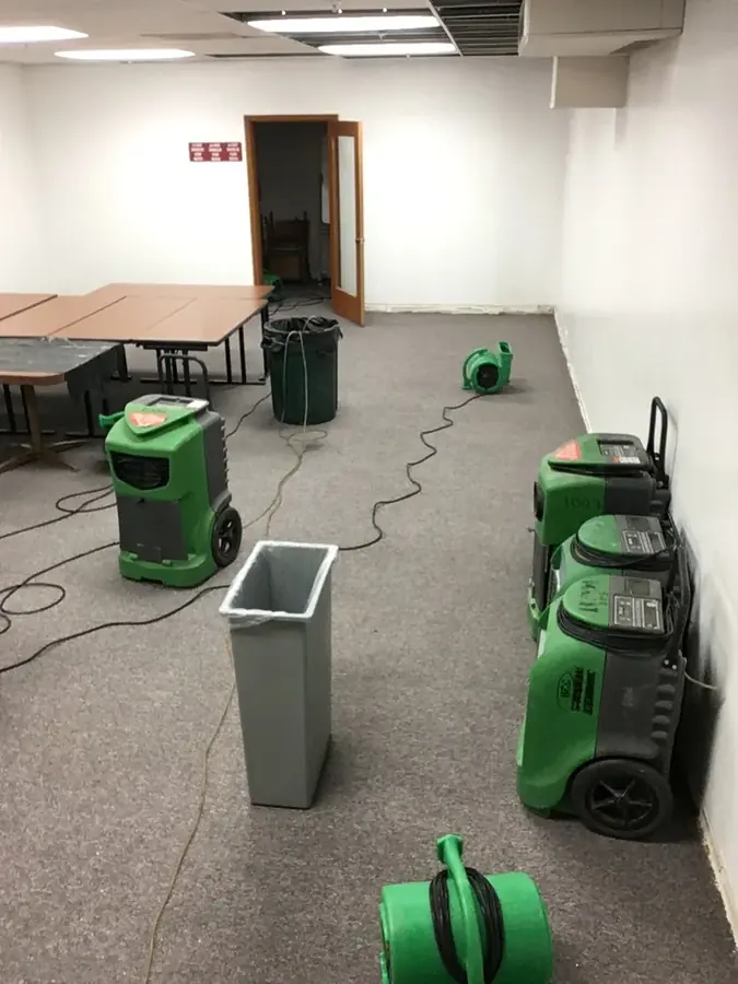 Drying equipment running in a Natick home after water extraction