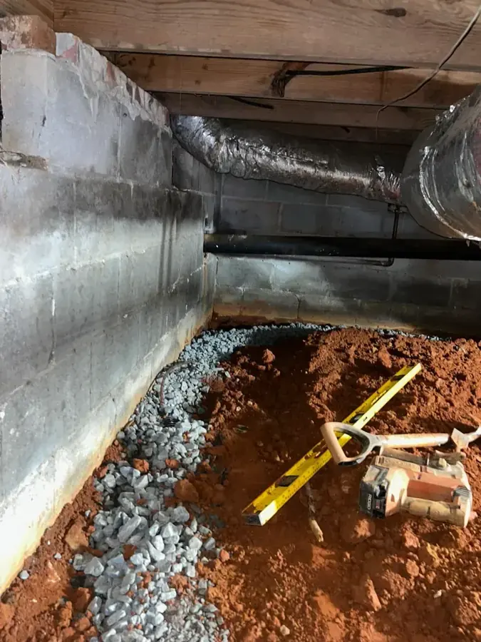 Wet Natick basement sump area with pipes after a pump failure